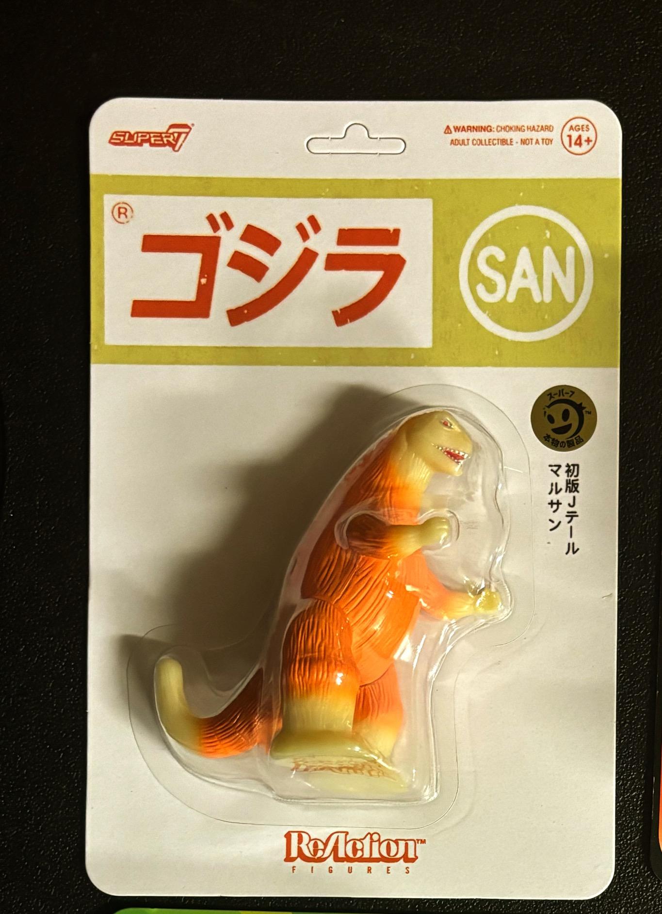 Super7 ReAction Marusan J-Tail figurina portocalie fosforescenta
