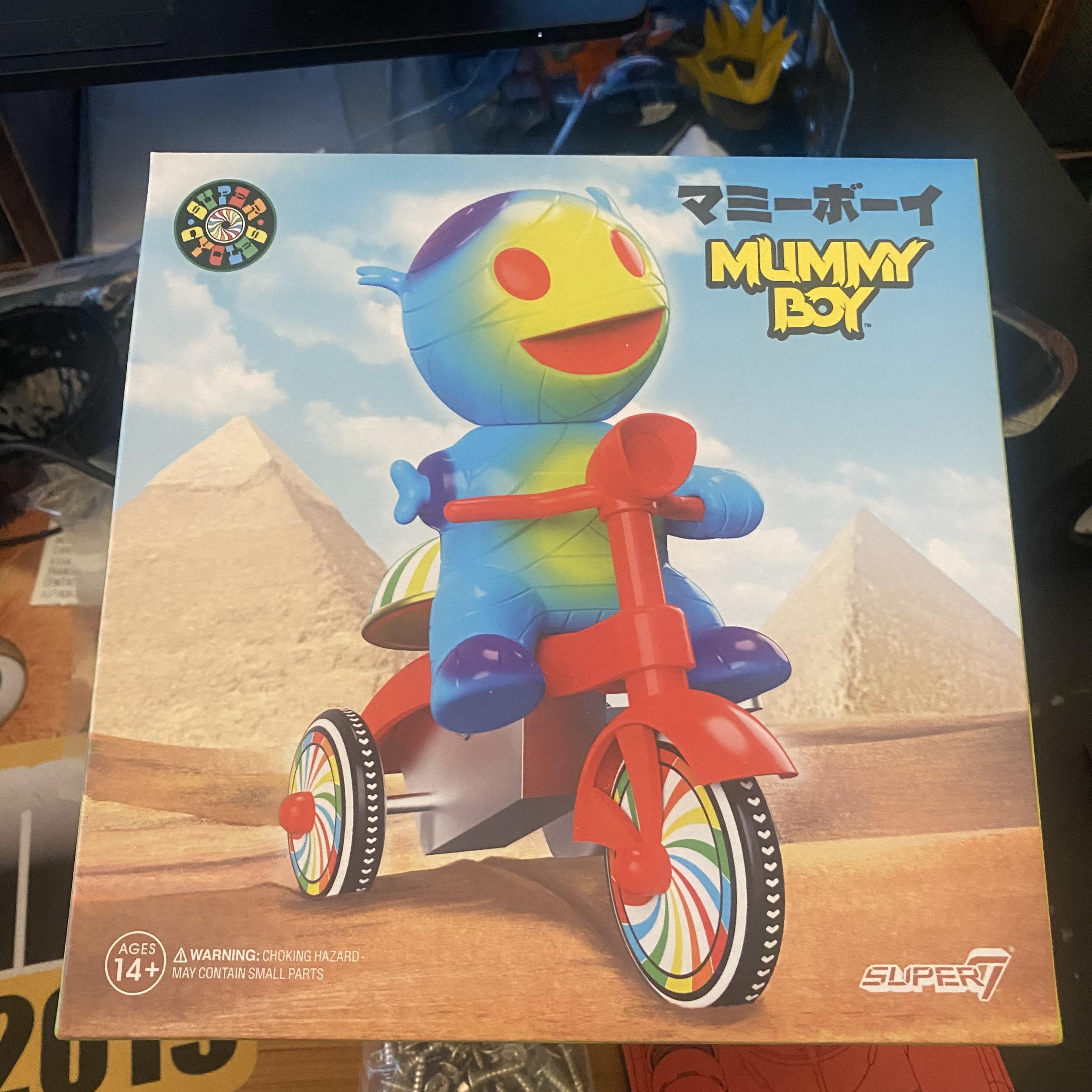 Super7 Super Cycles Mummy Boy figurina albastra tricicleta