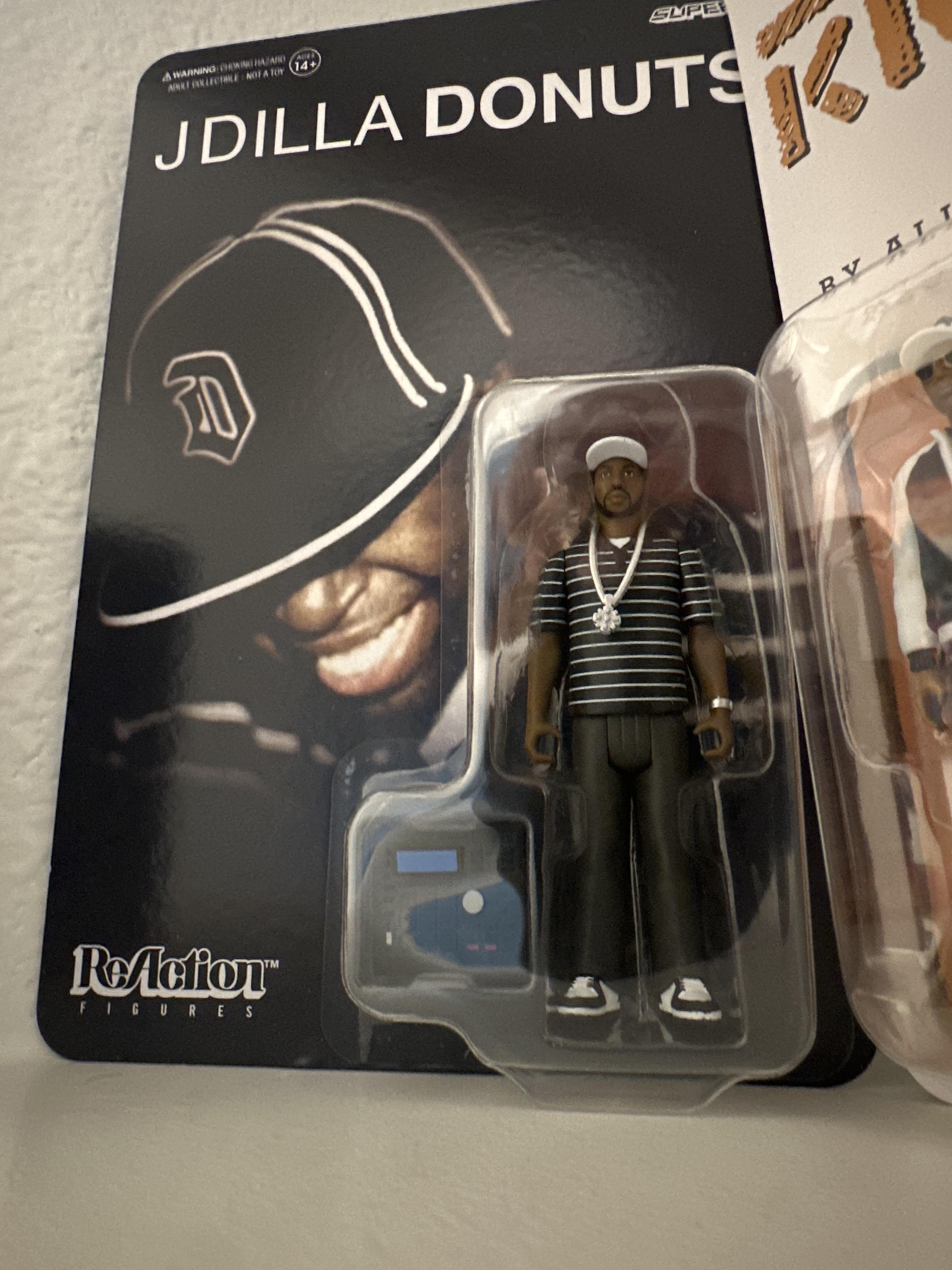 Super7 ReAction J Dilla Donuts Smile figurină