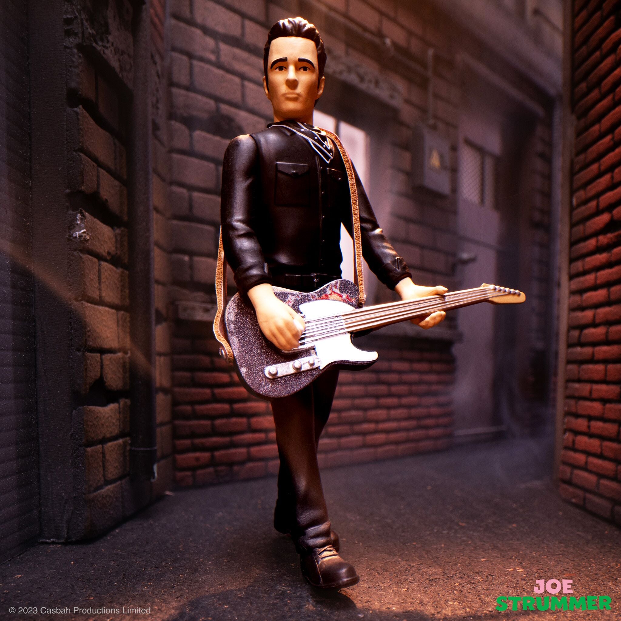Super7 ReAction Joe Strummer figurina 9,5 cm chitara
