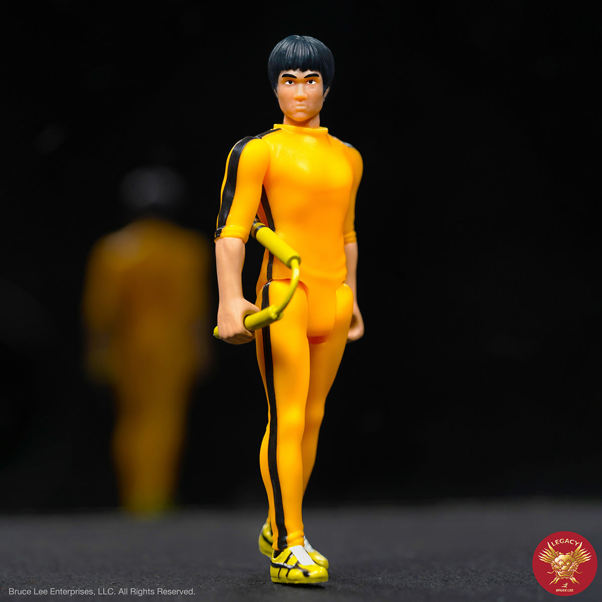 Super7 ReAction Bruce Lee Jumpsuit figurina 9,5 cm