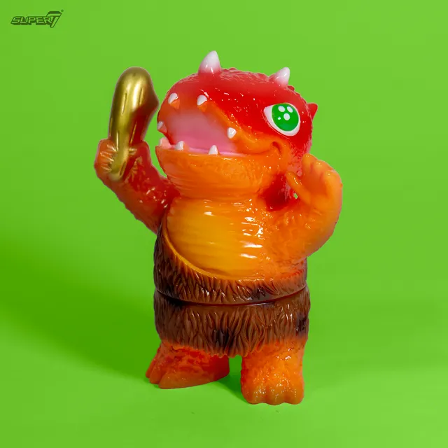 Super7 Japanese Vinyl Caveman Dinosaur figurina vinil portocalie