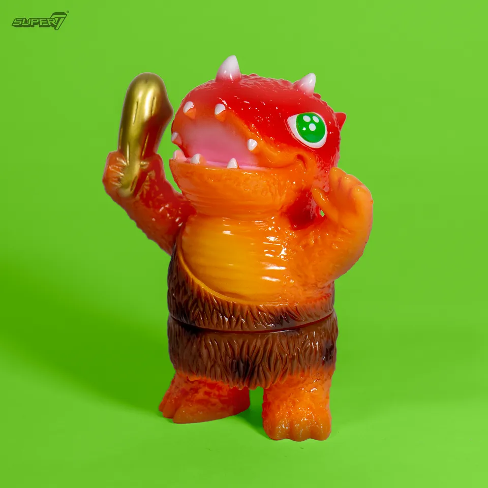 Super7 Japanese Vinyl Caveman Dinosaur figurina vinil portocalie